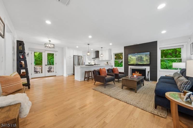 Just steps from Mountain Station at the end of a private lane, this incredible home was thoughtfully reimagined in 2022 to blend modern amenities and stylish design details.