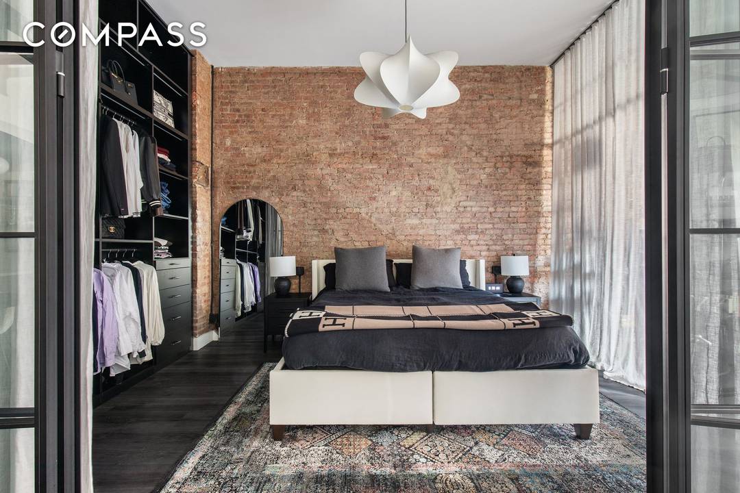 Mint condition loft with soaring 12ft ceilings and bright eastern sunlight.