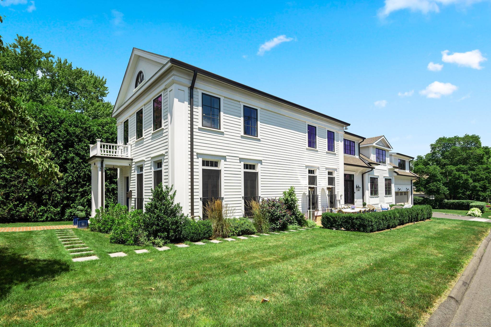 Luxury In Town Living ! Discover timeless elegance and modern ease in this beautiful, fully renovated Colonial home, just steps from the heart of downtown New Canaan.