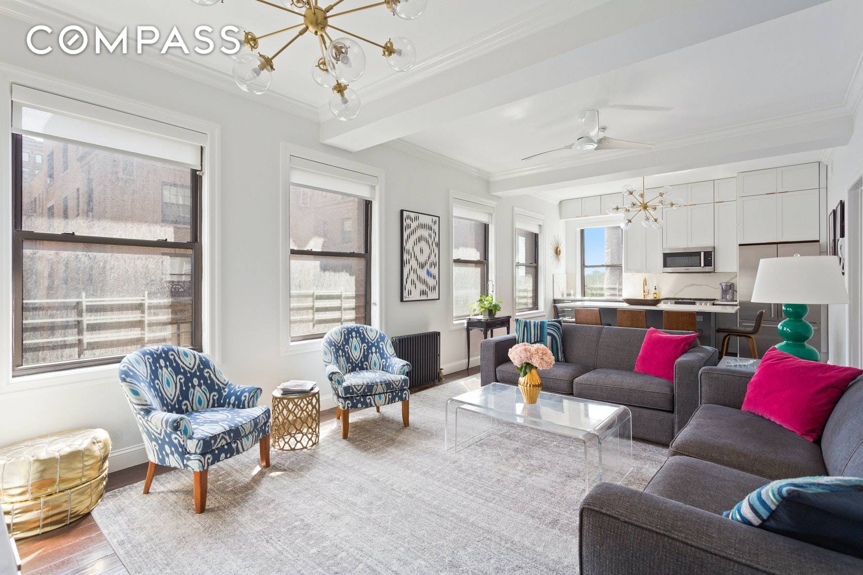 An impeccable renovation has been done in this spacious and airy top floor 3 bedroom 2 bath.