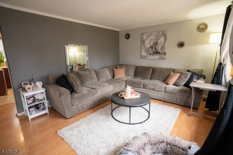 Welcome to this beautifully maintained and thoughtfully expanded Cape Cod, offering exceptional flexibility and space.