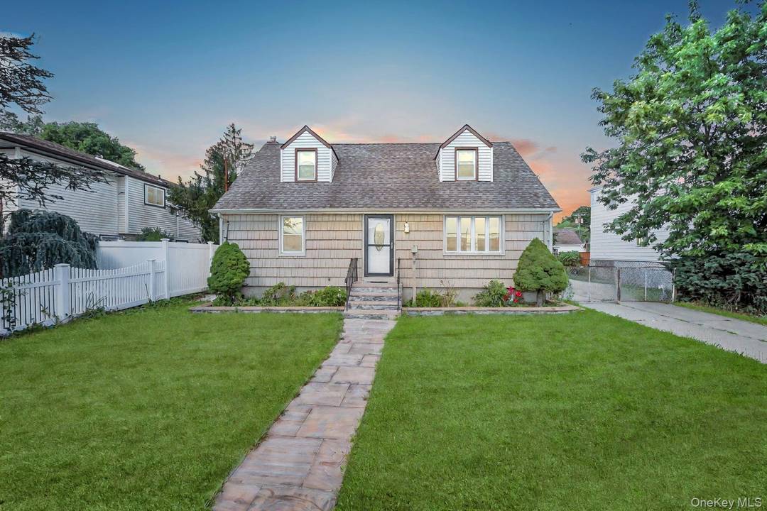Expanded Cape with 4 Bedrooms, 3 Baths amp ; Finished Basement Move In Ready !
