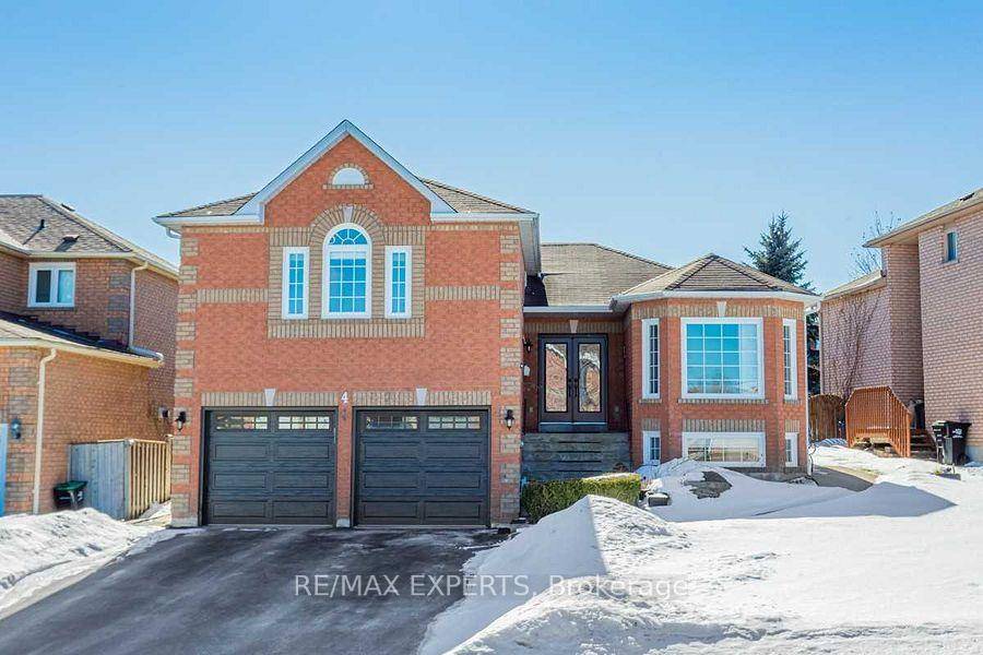 Light bright and spacious raised bungalow on a 60ft lot with master bedroom suite on the main level and huge no step shower stall in adjoining bathroom.