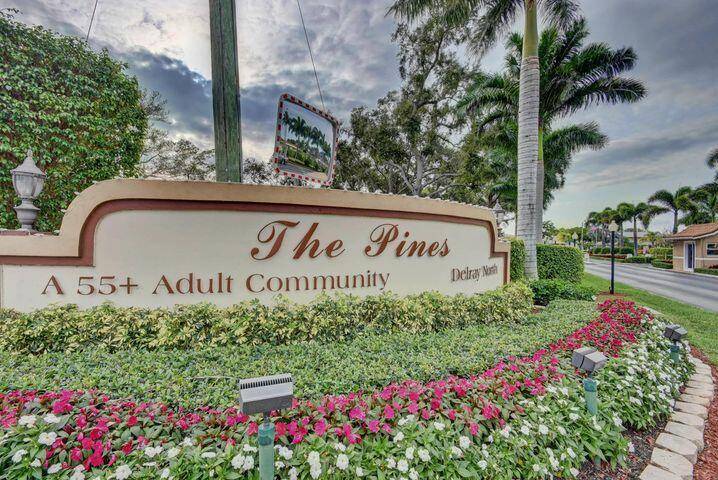 ONE STORY UPDATED VILLA IN SOUGHT AFTER PINES OF DELRAY NORTH A 55 COMMUNITY.