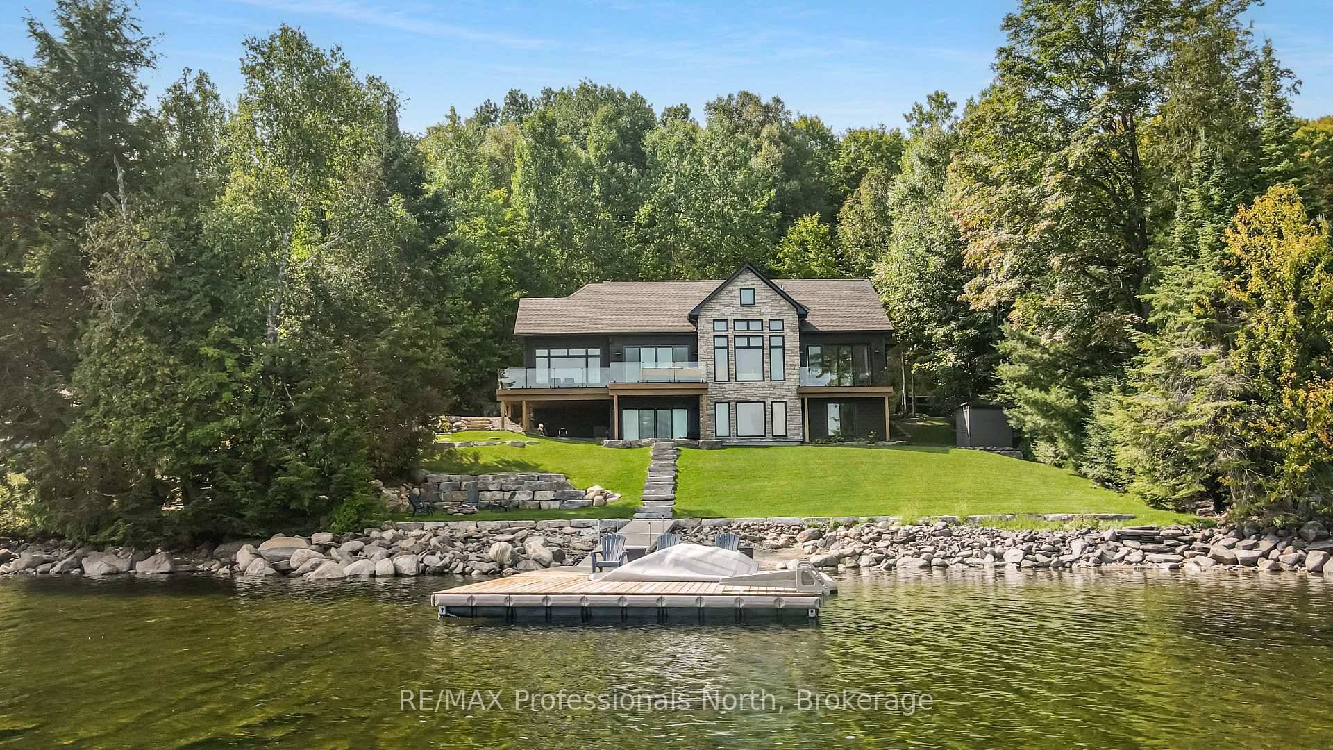 Step inside this brand new, 4600 sq ft lakeside retreat on beautiful Haliburton Lake.