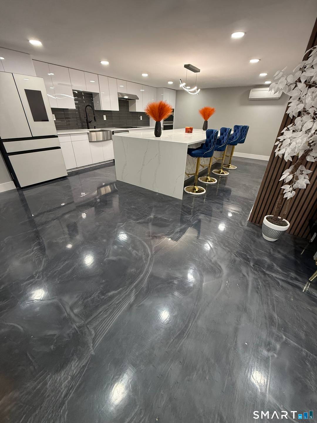 Stunning fully renovated modern home located at 91 Hartley Dr in Waterbury.