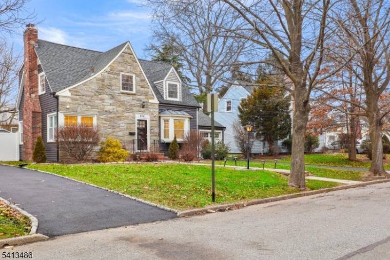 Welcome to this rare find, fully renovated home with an excellent layout, nestled in the heart of Sunnyside Linden.