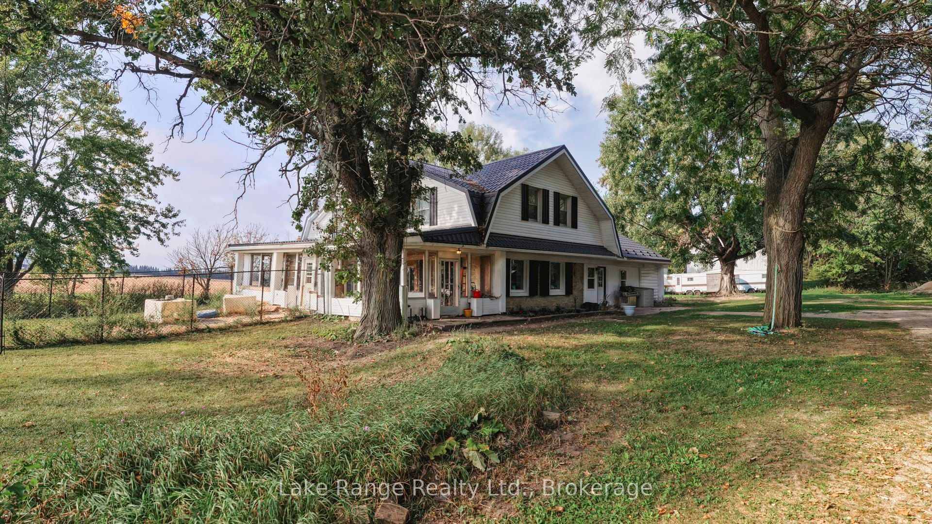 Experience the tranquility of country living in this spacious 5 bedroom home set on an expansive 5.