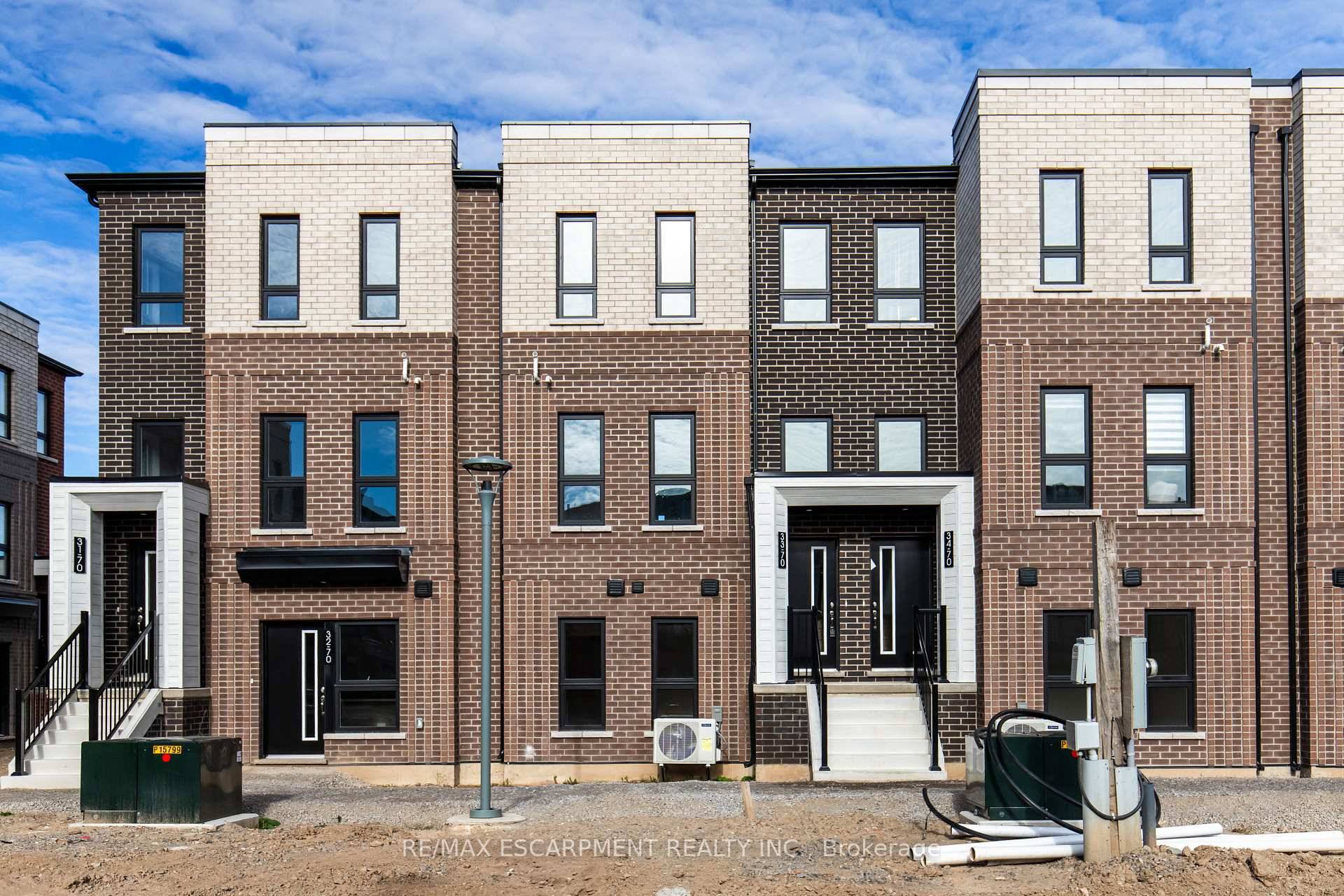 Stunning brand new, never lived in stacked townhome by award winning New Horizon Development Group.