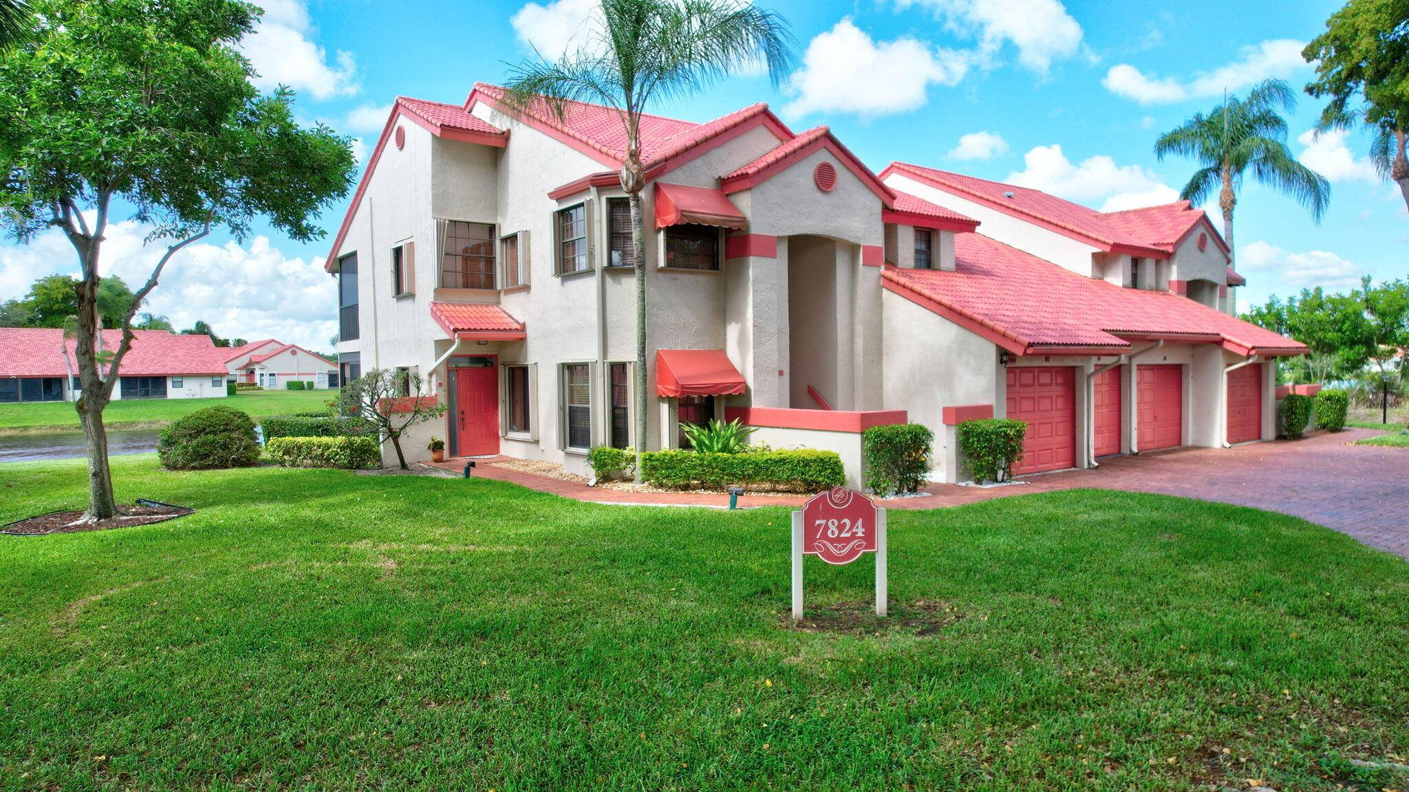 Spectacular Panoramic Lakefront Views from this alluring 2 BR 2 Bath 1st floor Condo with an oversized screened Glass enclosed lanai nestled in the enchanting Lexington Club 55 community.