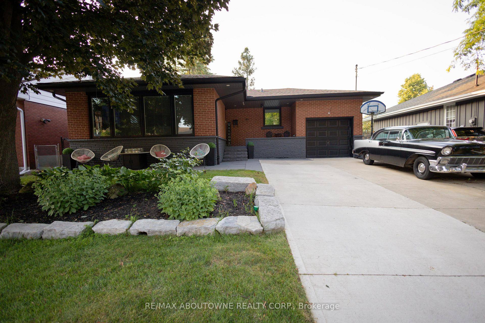 Welcome To This Beautifully Updated Bungalow In The Heart Of University Gardens, Dundas.