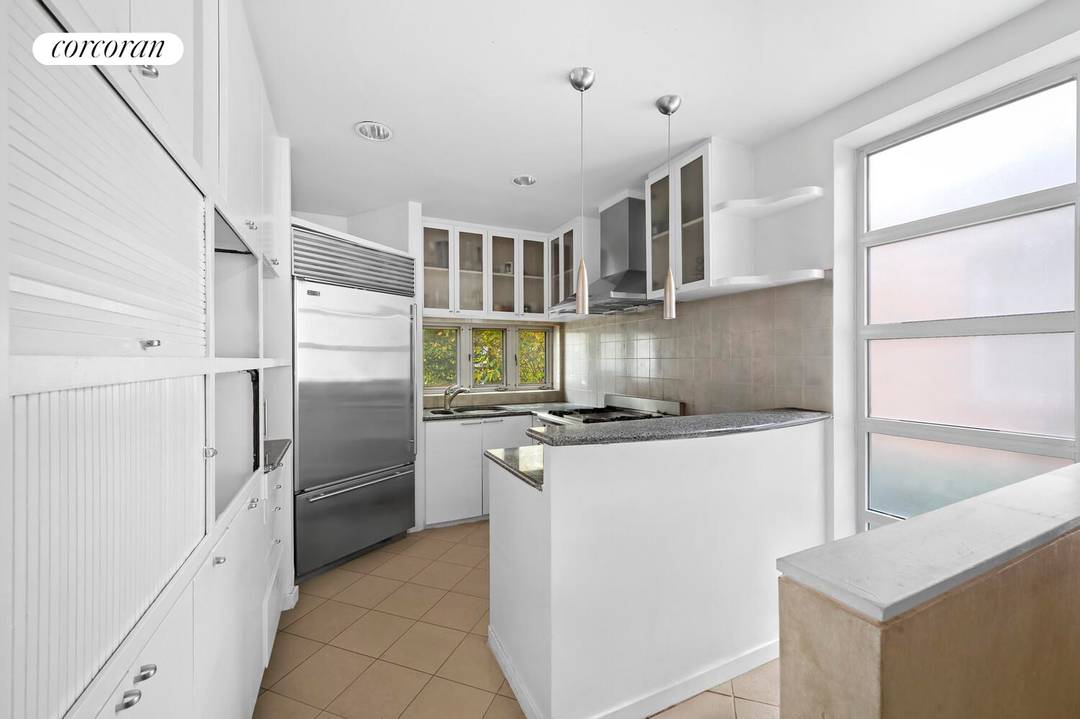 Beautiful Single Family Townhome in Coveted Lefferts Gardens, Brooklyn Nestled on picturesque Midwood Street, this 18 foot wide brick townhome offers classic Brooklyn charm and exceptional potential.