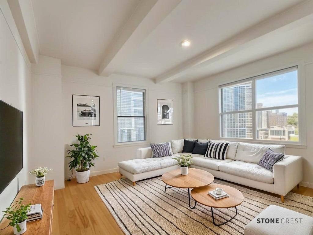 Full Service Doorman, 1 Bedroom Apartment with a modern open kitchen layout, located steps to Central Park.