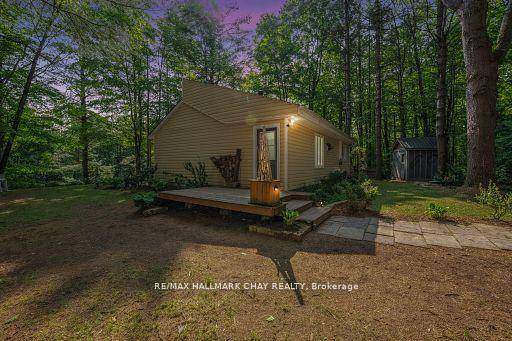 Escape to peace and privacy at this serene all season waterfront home nestled along the stunning Severn River.