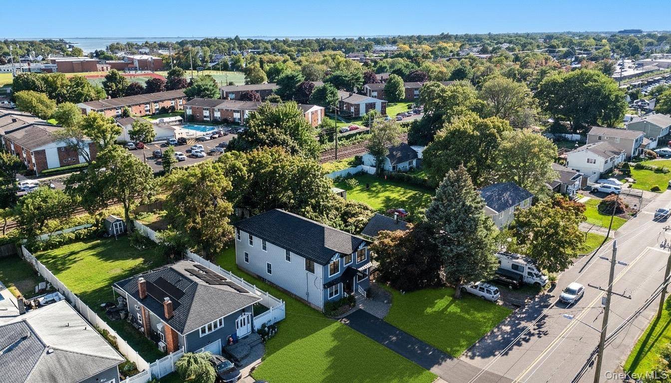 Welcome to 86 Moffitt Boulevard a charming and beautifully maintained home located in the heart of Islip.