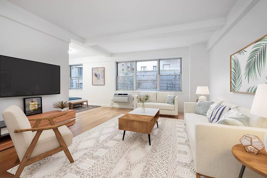 Beautifully renovated L shaped studio apartment with no board approval required is now available for purchase.