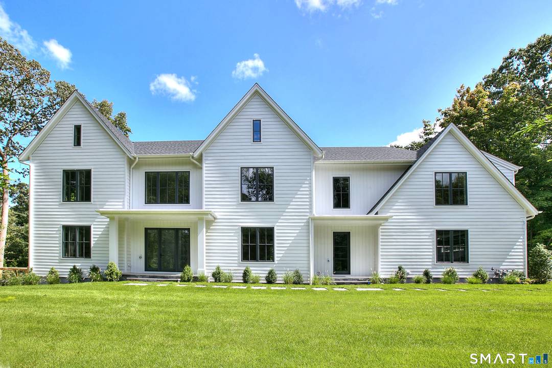 Stunning modern transitional home built by Compo Luxury Homes in 2024 and ideally located just minutes to downtown Westport, Compo Beach, and the train.