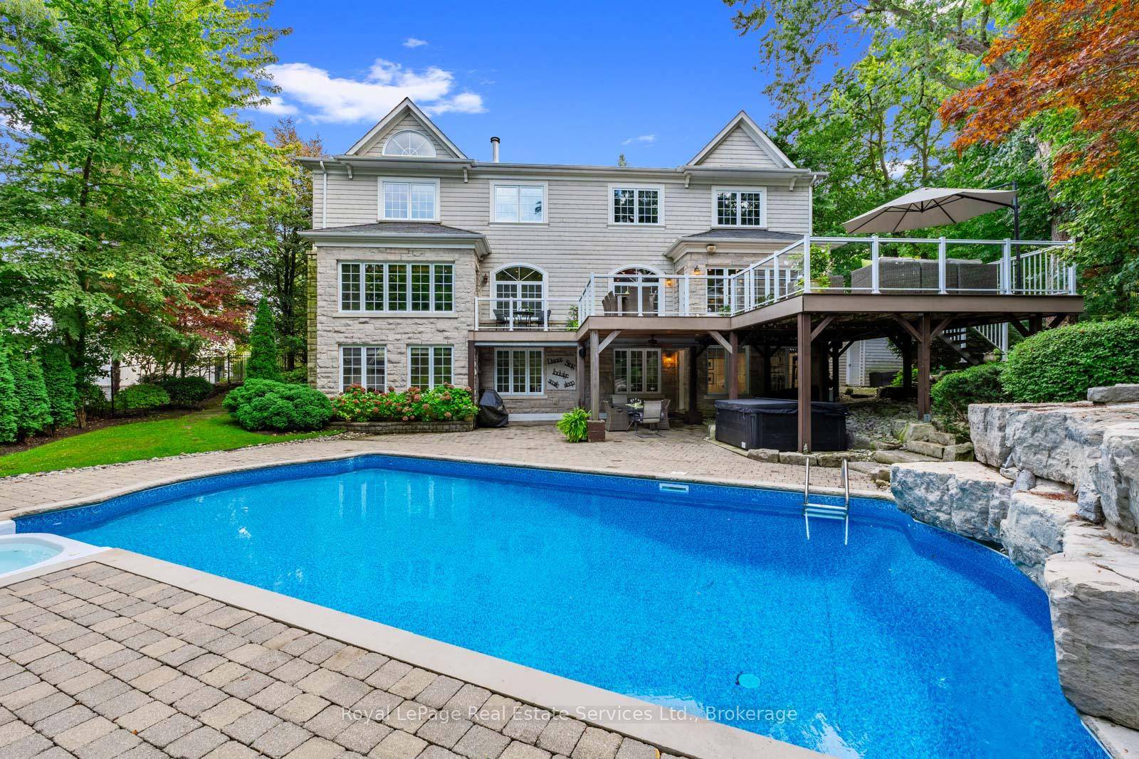 Located in coveted West Harbour, come discover tranquility and elegance at 235 Lakewood Drive.