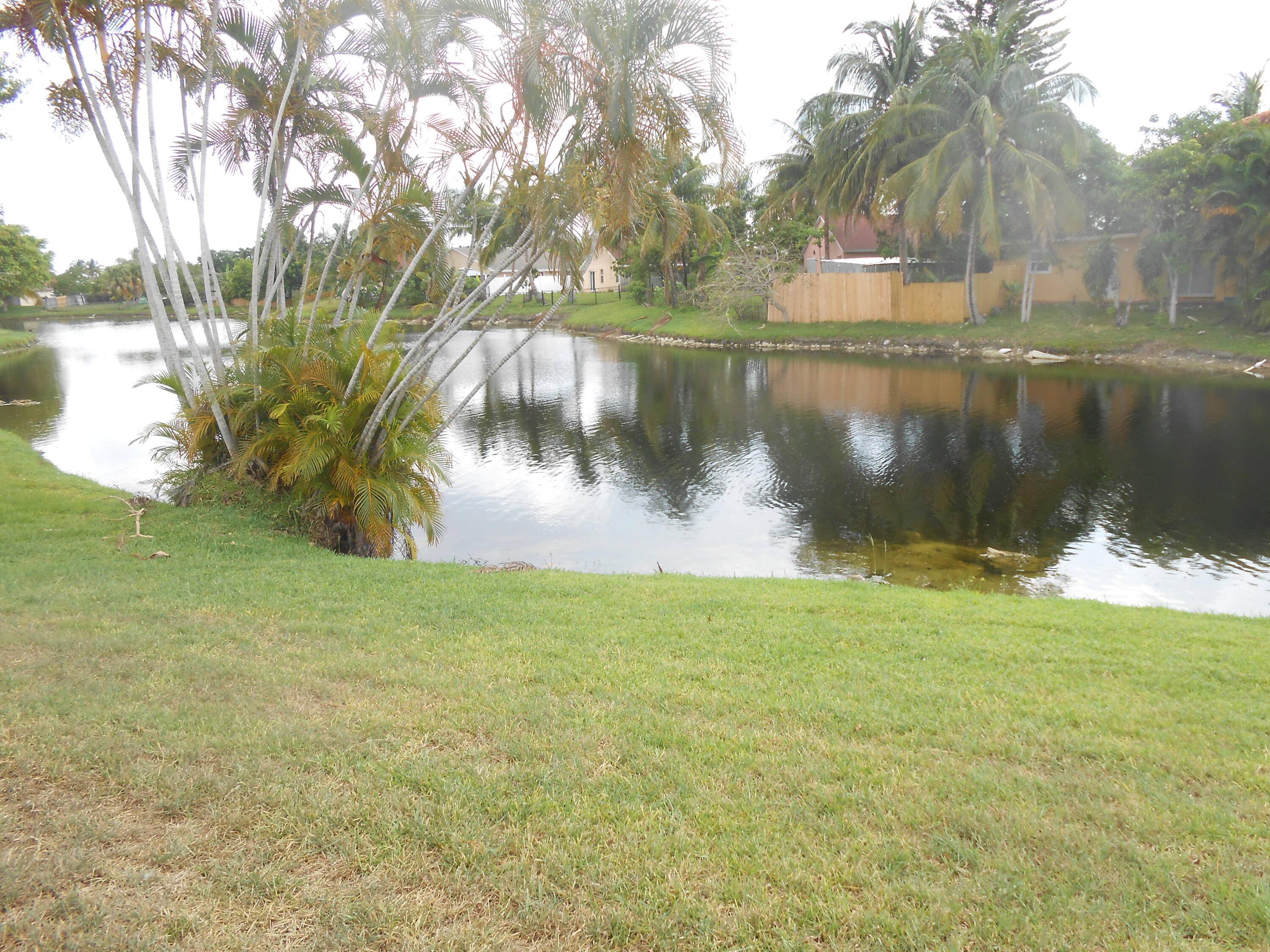 Pampered and well maintained waterfront Villa with garage.