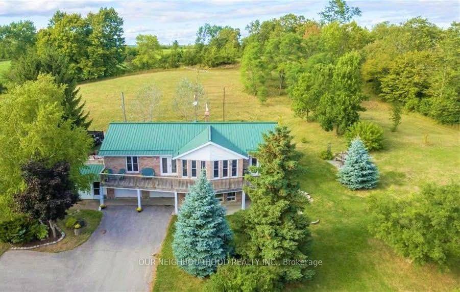 Nestled on nearly 9 acres of picturesque land, this horse ready estate offers the perfect blend of country living and modern conveniences.