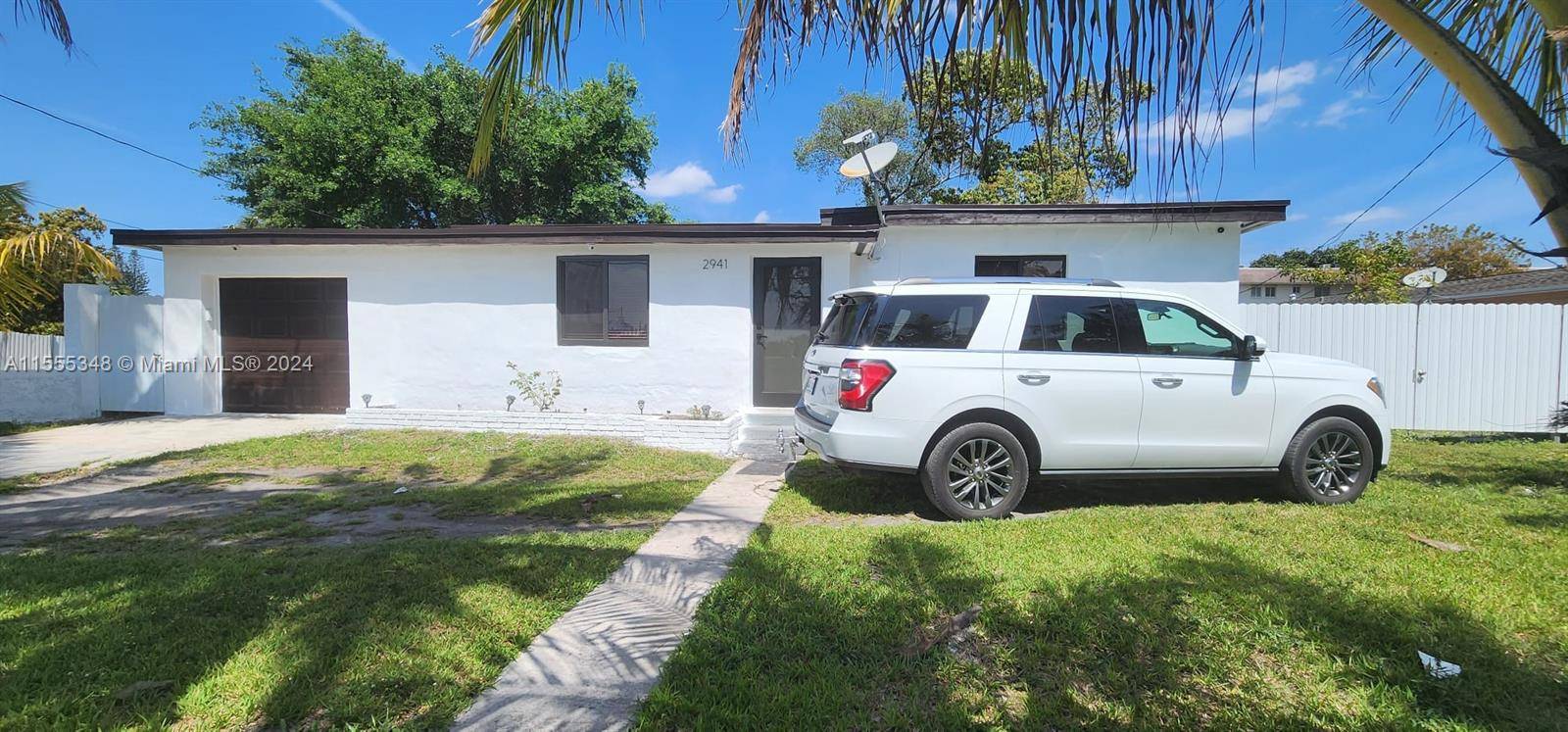 PROPERTY LOT IS 12, 197 SQ FT, HAVE ACCESS TO HOUSE THROUGH BACK STREET WITH DOUBLE DOOR, ENOUGH SPACE FOR BOAT, TRUCK, RV AND MORE.