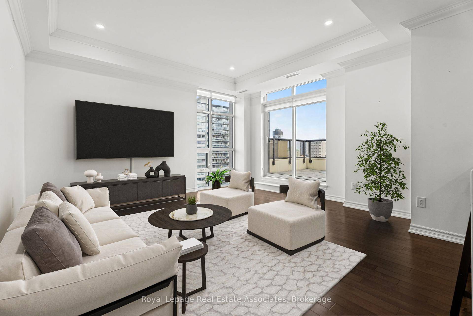 Experience luxury living in this rare, stunning penthouse condominium, complete with two prime parking spaces and an expansive 430 sq ftprivate terrace.