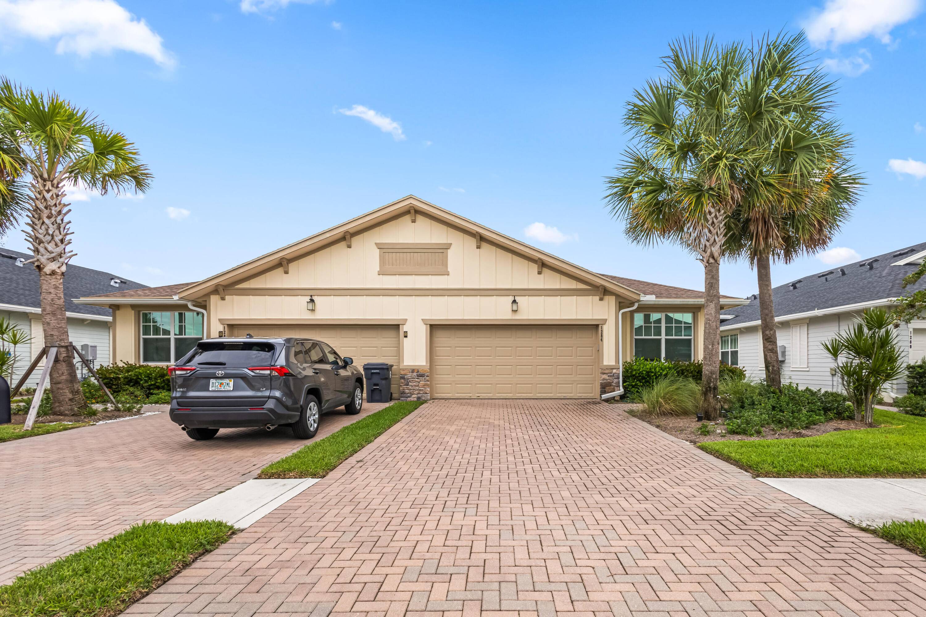 Welcome to this stunning modern villa nestled within the highly sought after Arden resort community in Loxahatchee.