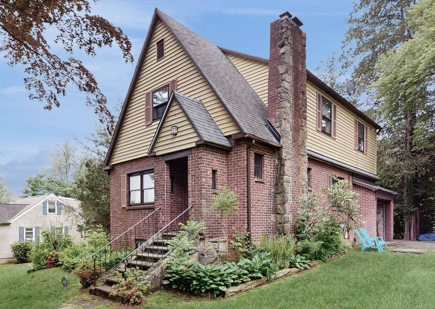 Welcome to this charming brick Tudor on a level corner lot in the Byram Hills School District.