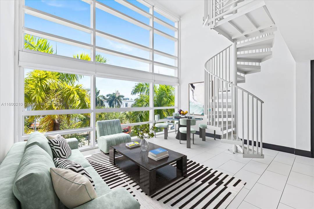 Experience MODERN BEACHSIDE LIVING in your new three story loft including your own PRIVATE ROOFTOP in the desirable South of Fifth neighborhood in Miami Beach.
