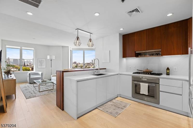 Welcome home to 1000 Maxwell Lane 10J, a meticulously upgraded 1 bedroom, 1.