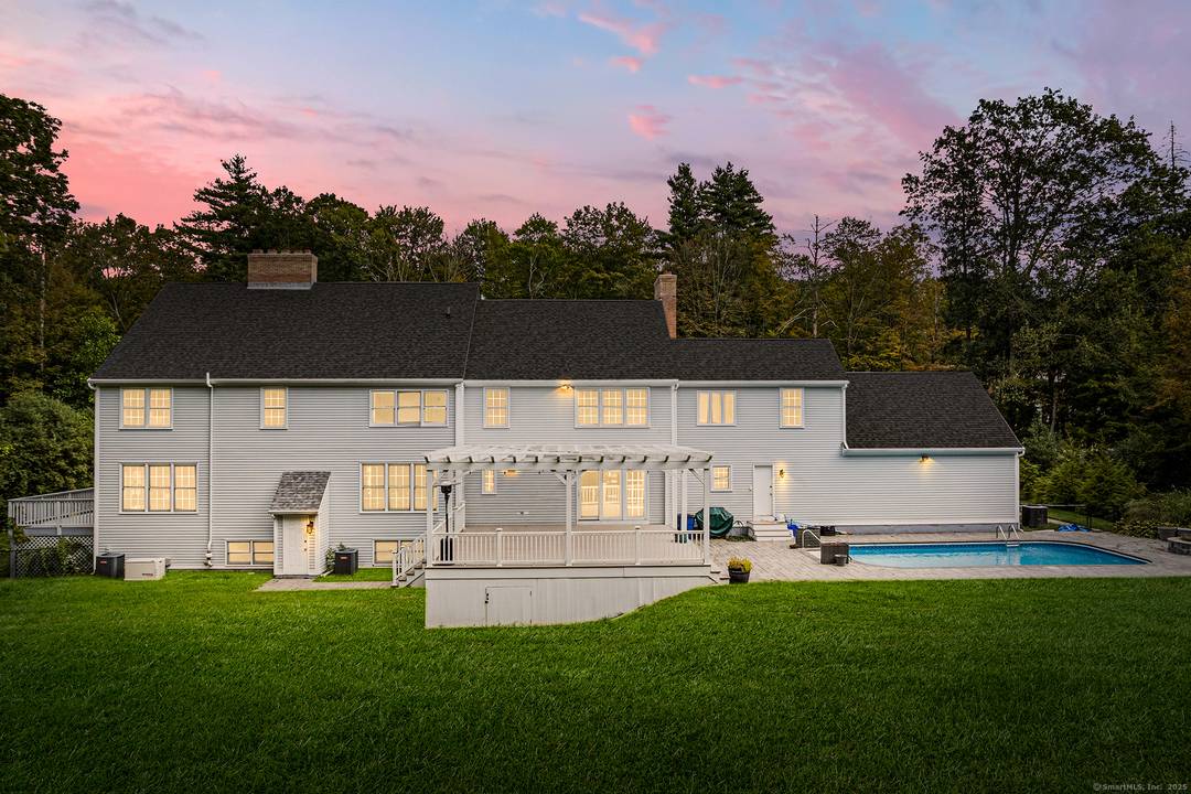 Sophisticated and spacious, this custom built Colonial spans over 5, 000 sq.
