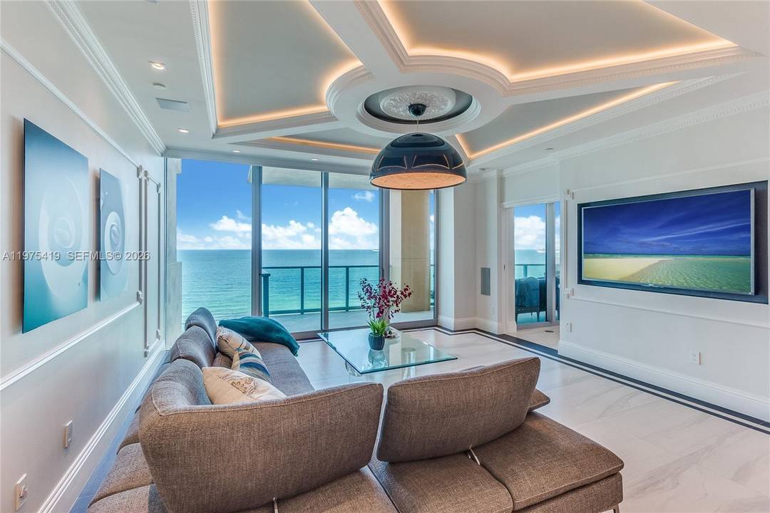 Direct ocean views welcome you the moment you step off your private elevator into this exceptional Lower Penthouse at Il Villaggio.