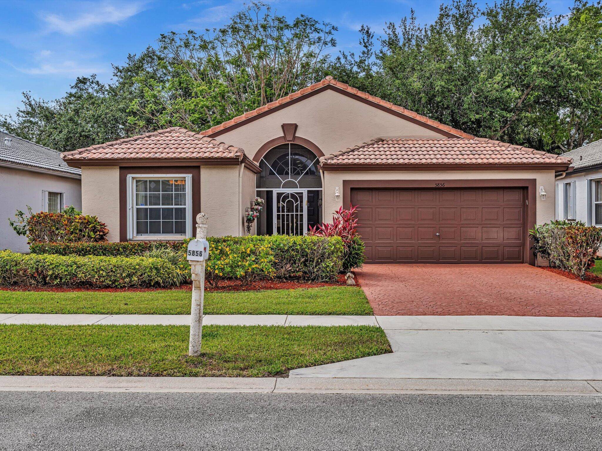 Move right in ! Very well maintained furnished home in Majestic Isles with extended floor plan, bonus glass enclosed Florida room, and sunny patio.
