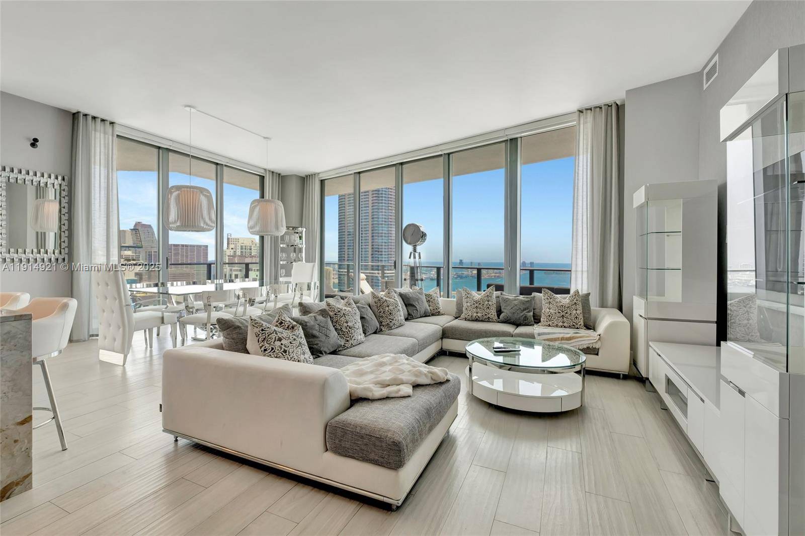Spacious northeast corner penthouse unit with panoramic views of Biscayne Bay over to key Biscayne, Miami Beach and beyond.