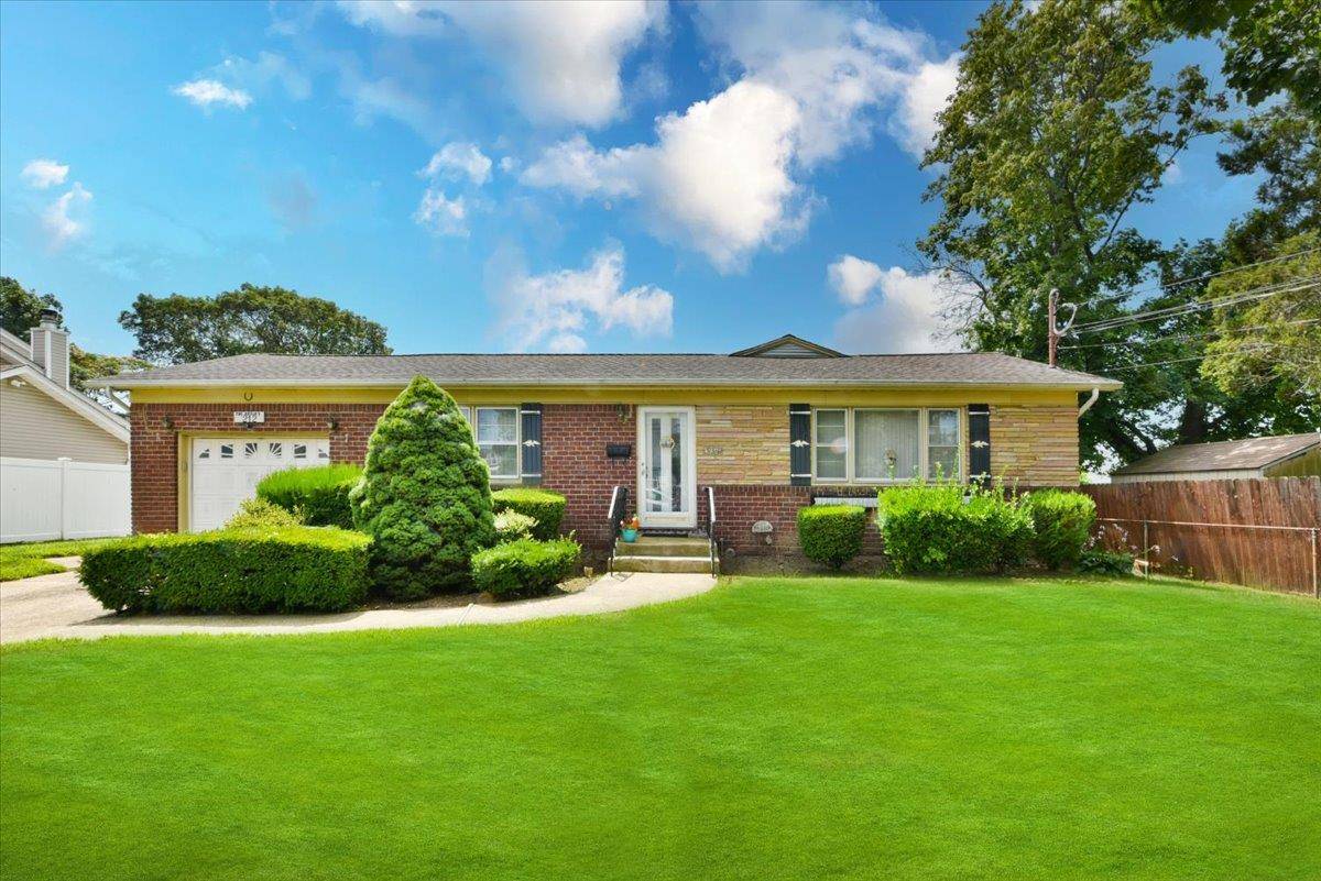 Welcome to 212 N Cedar, a charming ranch style home with endless potential, perfectly situated on an oversized 80 x 100 lot.