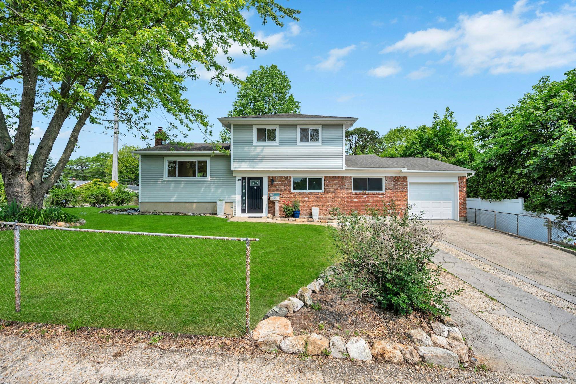 Welcome to your new home in Patchogue Village this beautifully fully renovated home featuring 4 spacious bedrooms, an office, 2 full bathrooms, and 2 half baths.