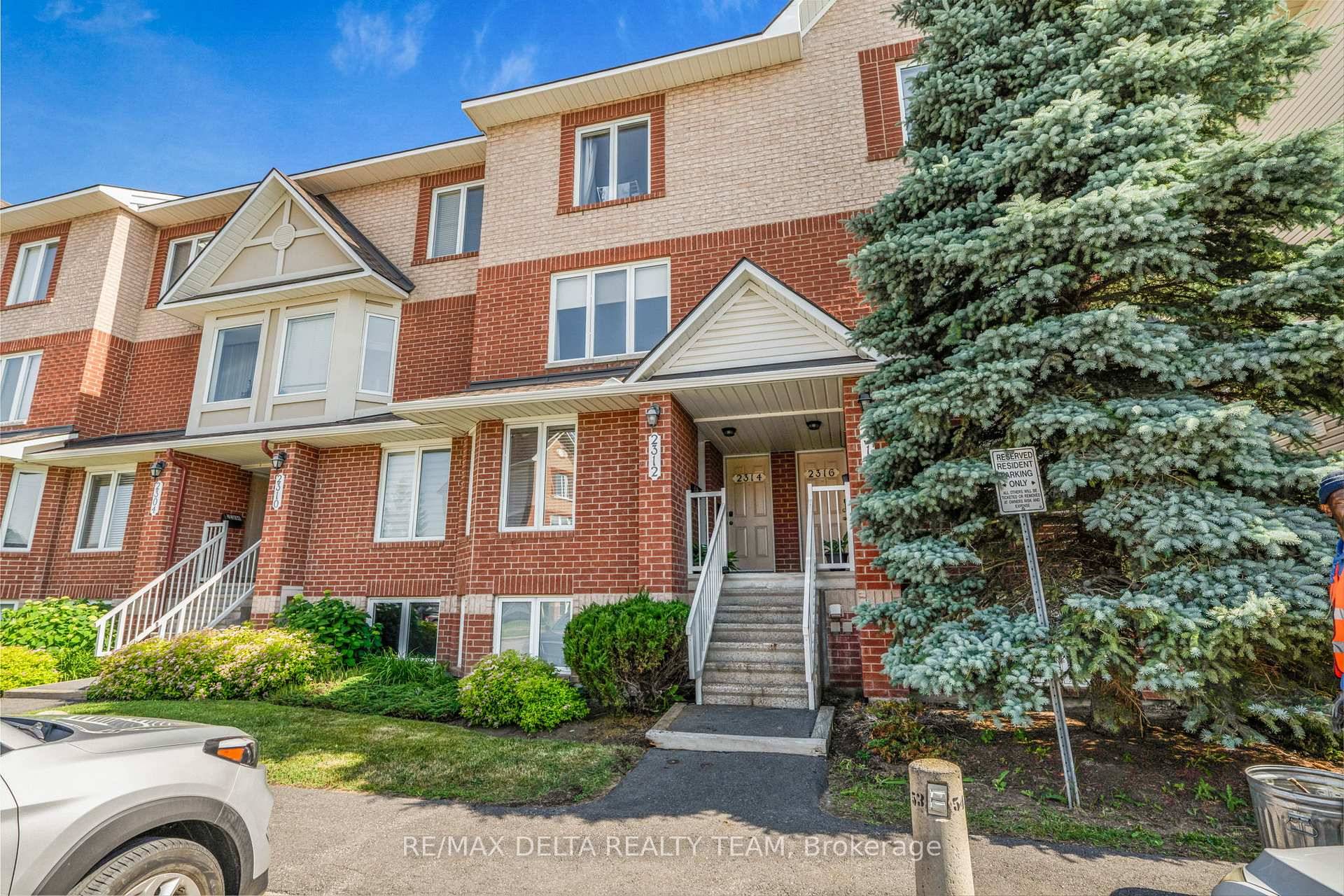 Beautiful move in ready Terrace Home with no rear neighbours backing onto large manicured urban vegetation, with TWO parking spots, one being directly in front of the unit !