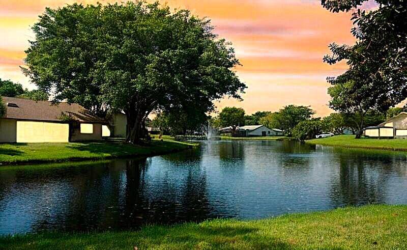 Beautiful direct lake front home w amazing lake views enjoyed from your private screened in Lanai in Boca Delray Golf amp ; Country Club 9 amp ; 18 holes with ...