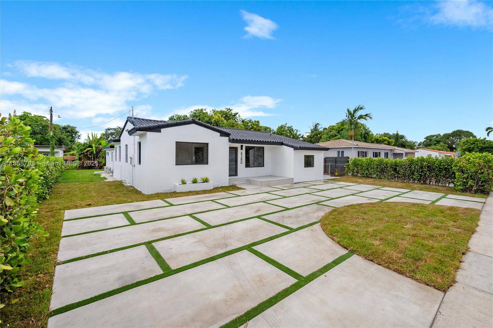 Beautifully renovated 5BR 3BA multi generational home with a split floor plan and private in law quarters.
