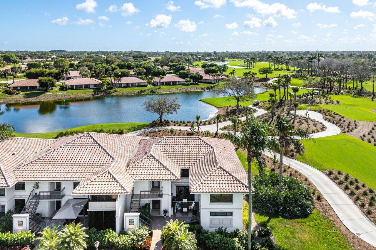 Panoramic, sweeping lake golf views from every window of this condo !