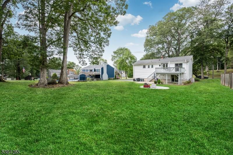 Welcome to this 3 bedroom plus bonus guest room on ground floor, with 2.