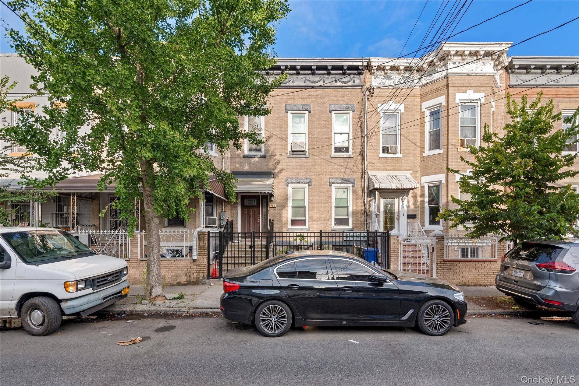 Welcome to 285 Lincoln Avenue, a beautifully updated legal two family home thoughtfully laid out as a three unit residence.