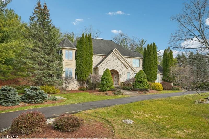 Welcome home to this beautifully maintained 4 bedroom, 4 bath Colonial offering approximately 4, 700 sq ft of living space, perched atop a hill in the desirable Vizcaya Estates.