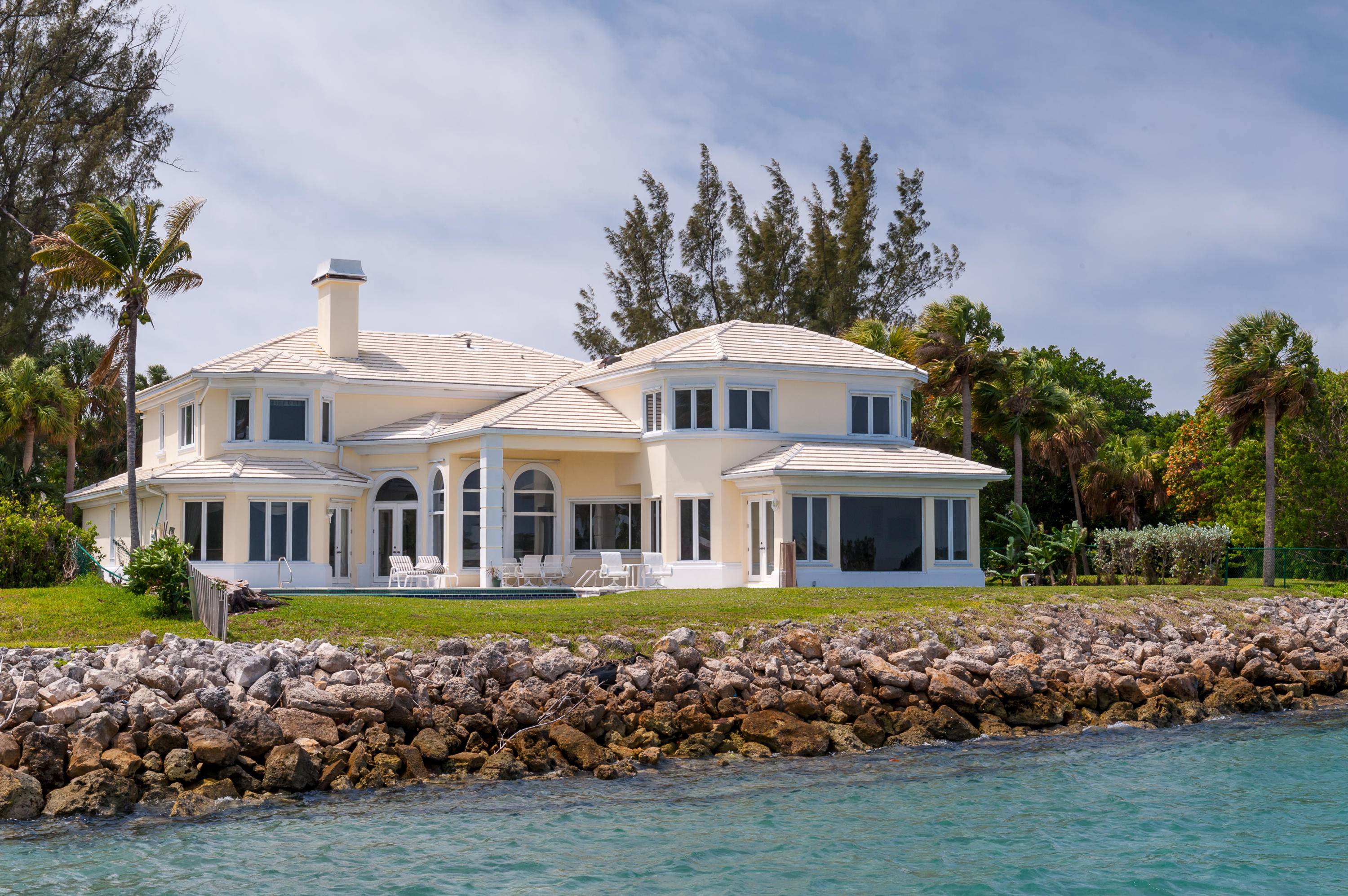 Waterfront, traditional, two story home with 6 bedrooms and 6.