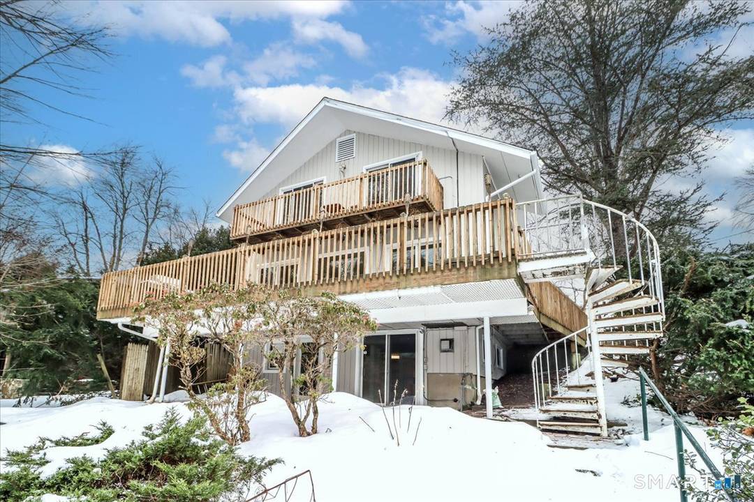 Nestled along the shore of sought after Candlewood Lake, this direct waterfront Contemporary home delivers the ultimate lake living experience !