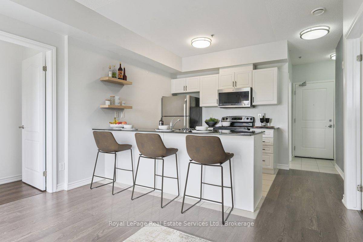 VACANT MOVE IN READY 2 bedroom unit with unobstructed serene greenspace and pond views.