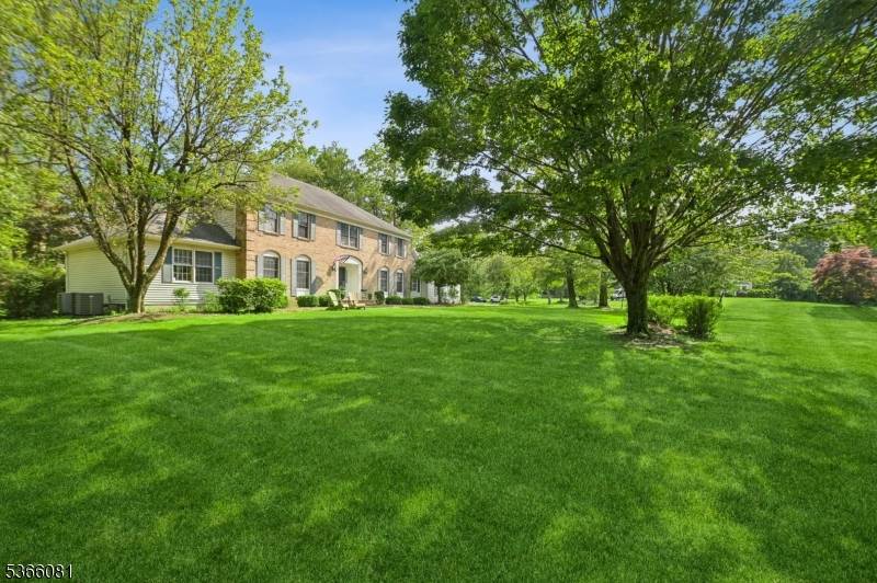 Set in one of Chester's most coveted cul de sac neighborhoods just minutes from the shops, dining, and charm of Chester Borough this inviting Center Hall Colonial offers it all.