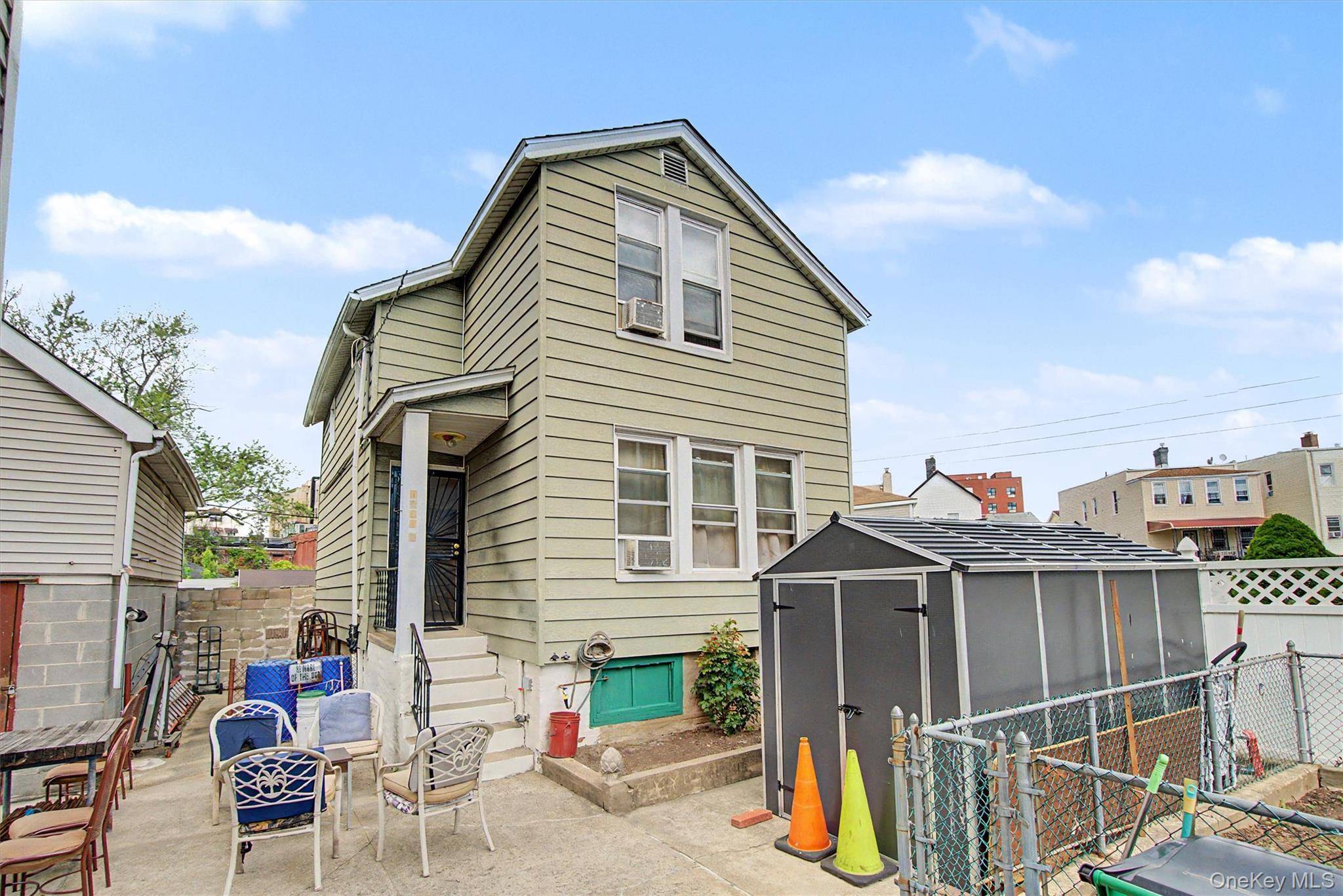 Single family with large driveway that fits 3 cars and a huge gardening area.