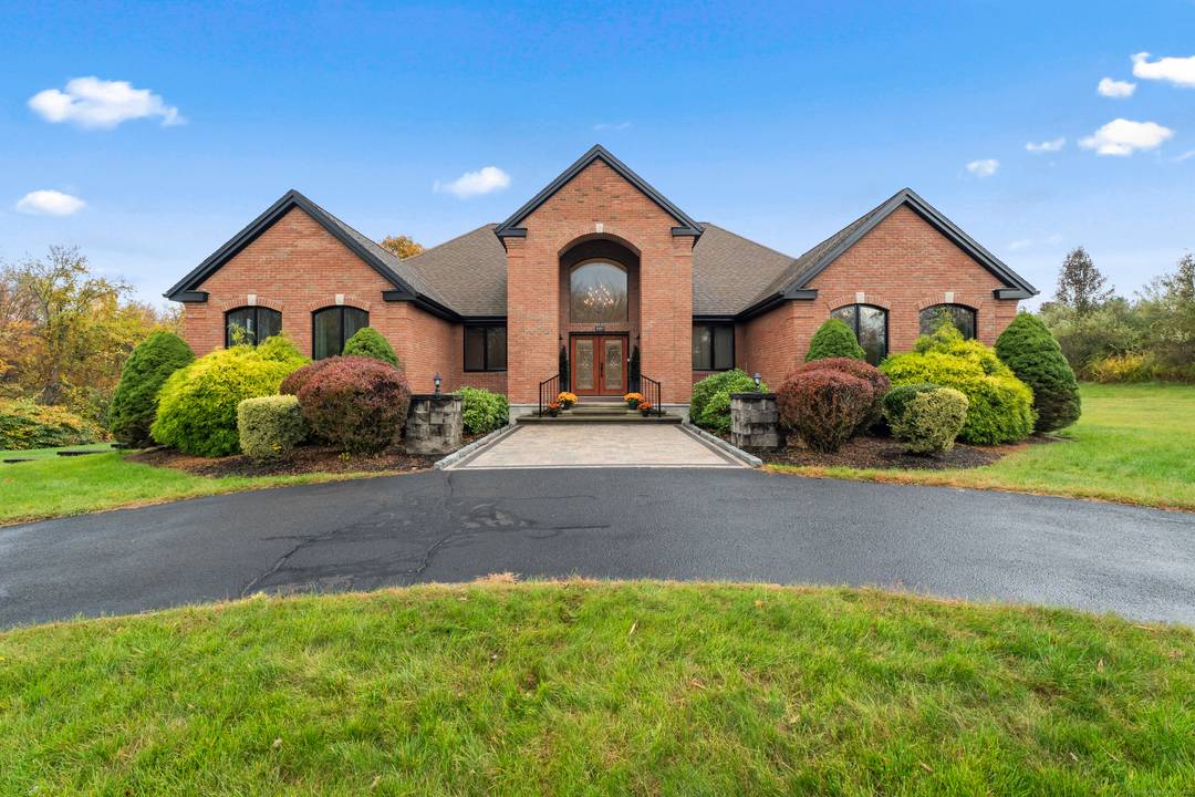 Experience the perfect blend of space, style, and comfort in this stunning contemporary ranch set on over 5 acres of land !