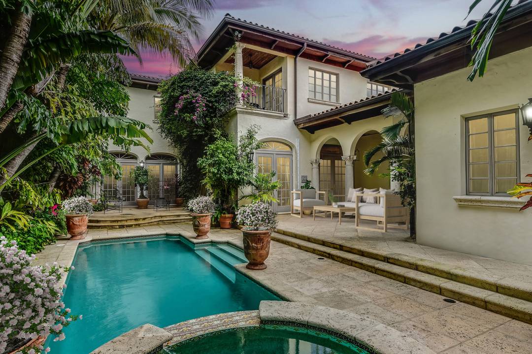 Spacious Mediterranean Townhouse in a most desirable location deep lot 171 feet provide max privacy on the highly coveted Lake block of Brazilian Avenue.